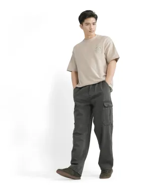 Rare Rabbit Men Hork Dark Green Cotton Fabric Elastic Waistband Multi Pocket Baggy Fit Cargo Style Jeans